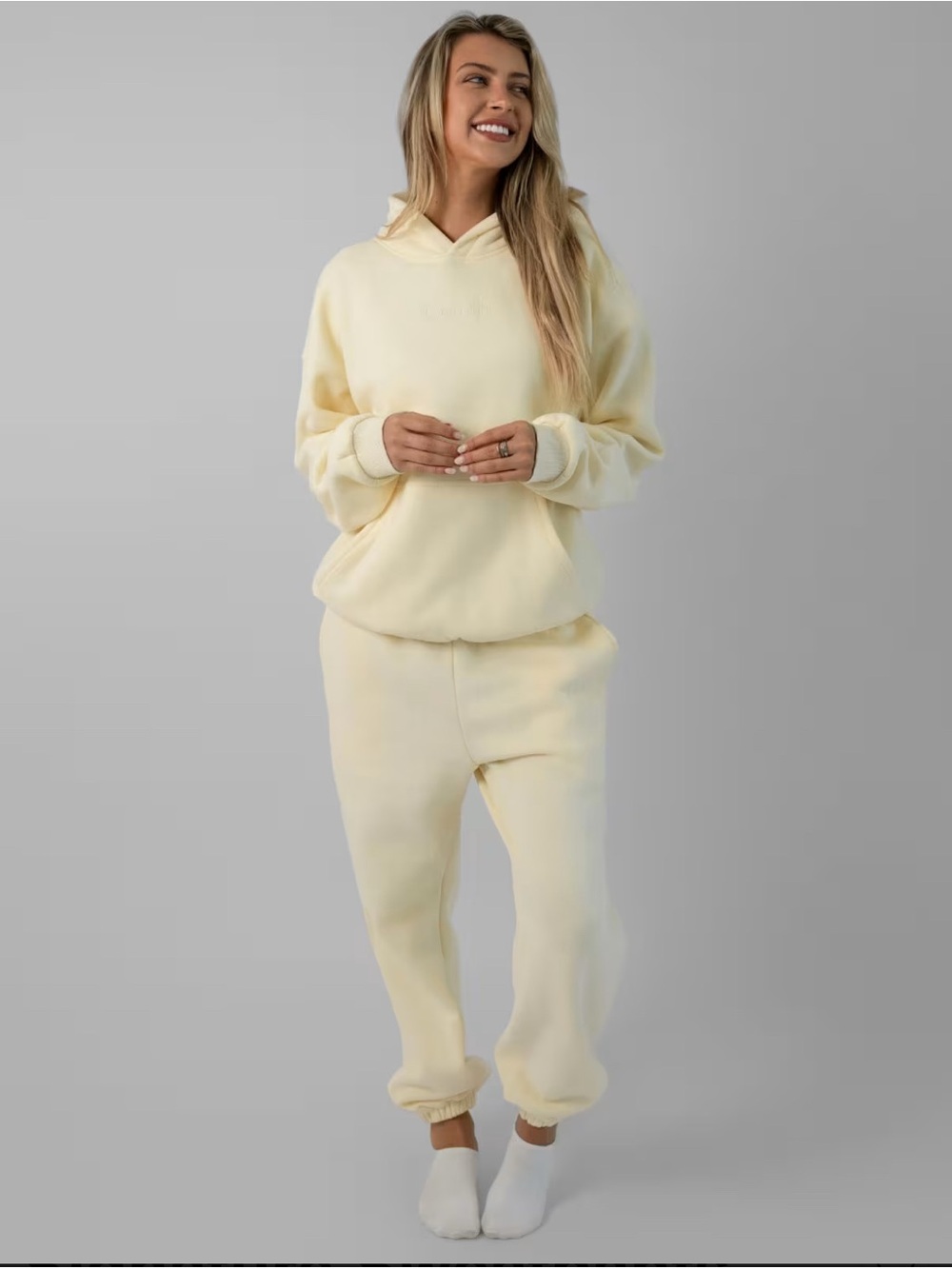 Aritzia Hoodie and Jogger Set in color Cream Froth (light butter yellow)